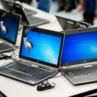 Two open laptops on a desk