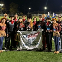 McLean Band holding banner at State Championship